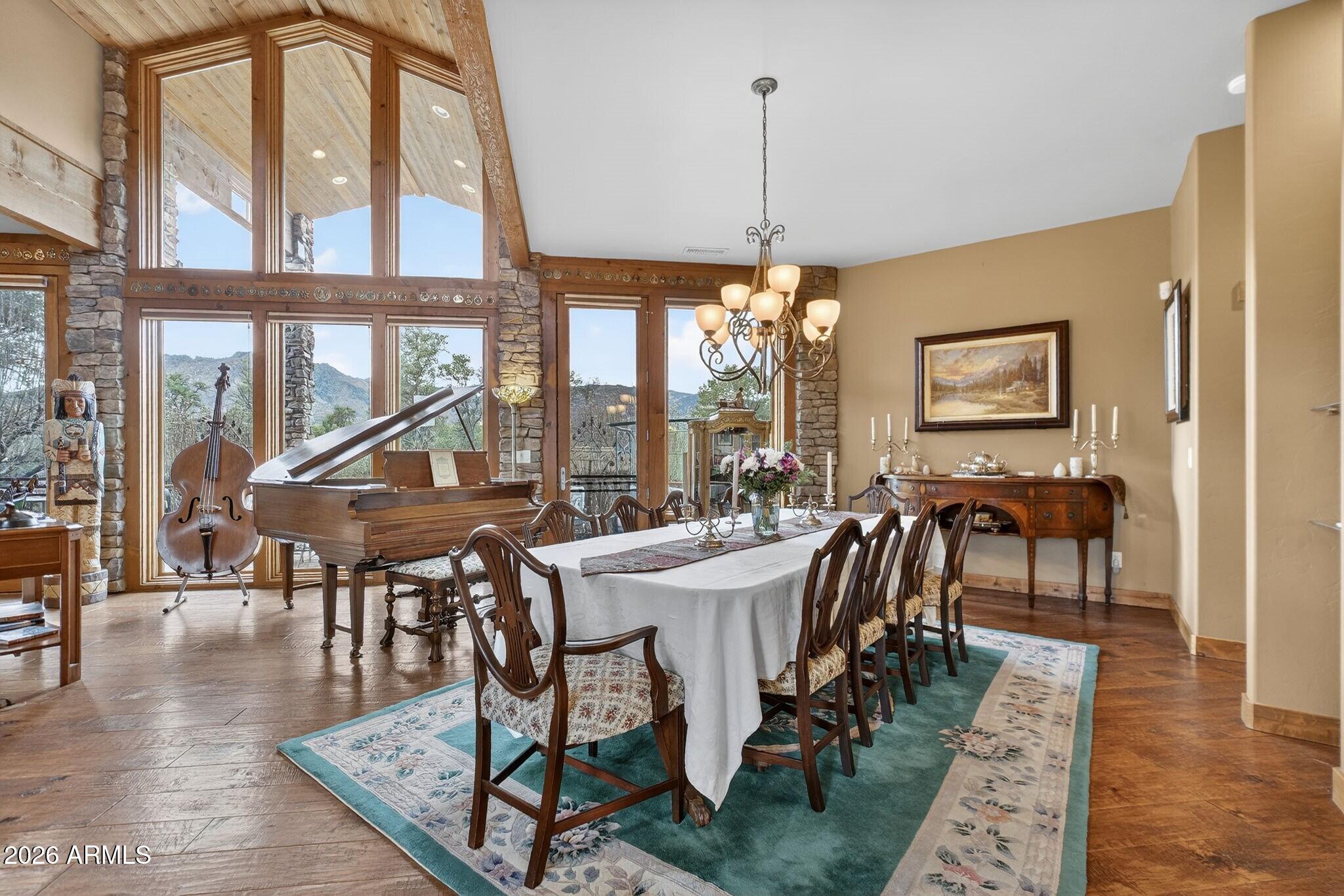 9820 Clear Fork Road Prescott, AZ 86305 - Photo 9 of 75 a view of a dining room with furniture window and wooden floor