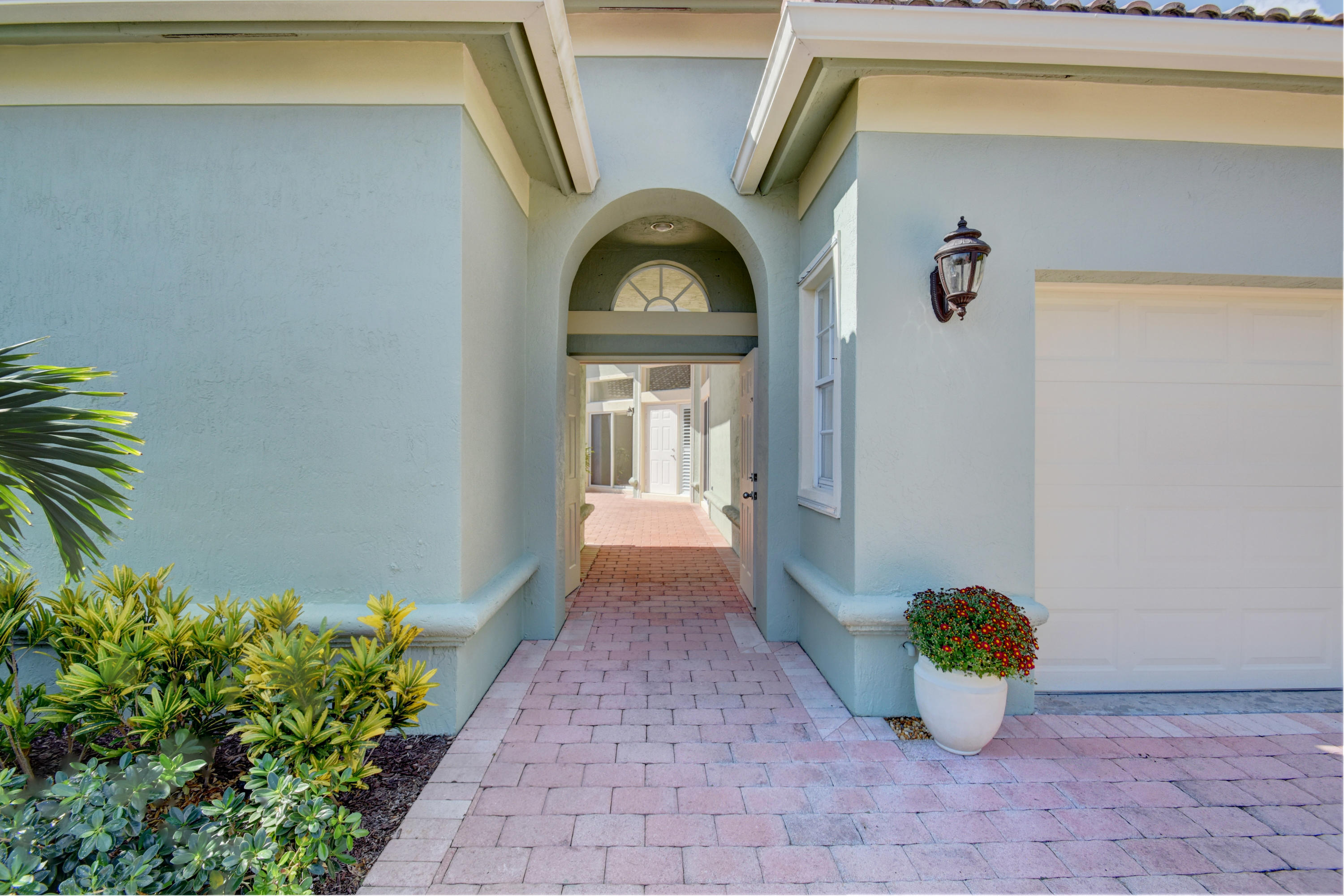 7201 Northwest Turtle Walk Boca Raton, FL 33487 - Photo 2 of 39 Double Door Entry into Courtyard