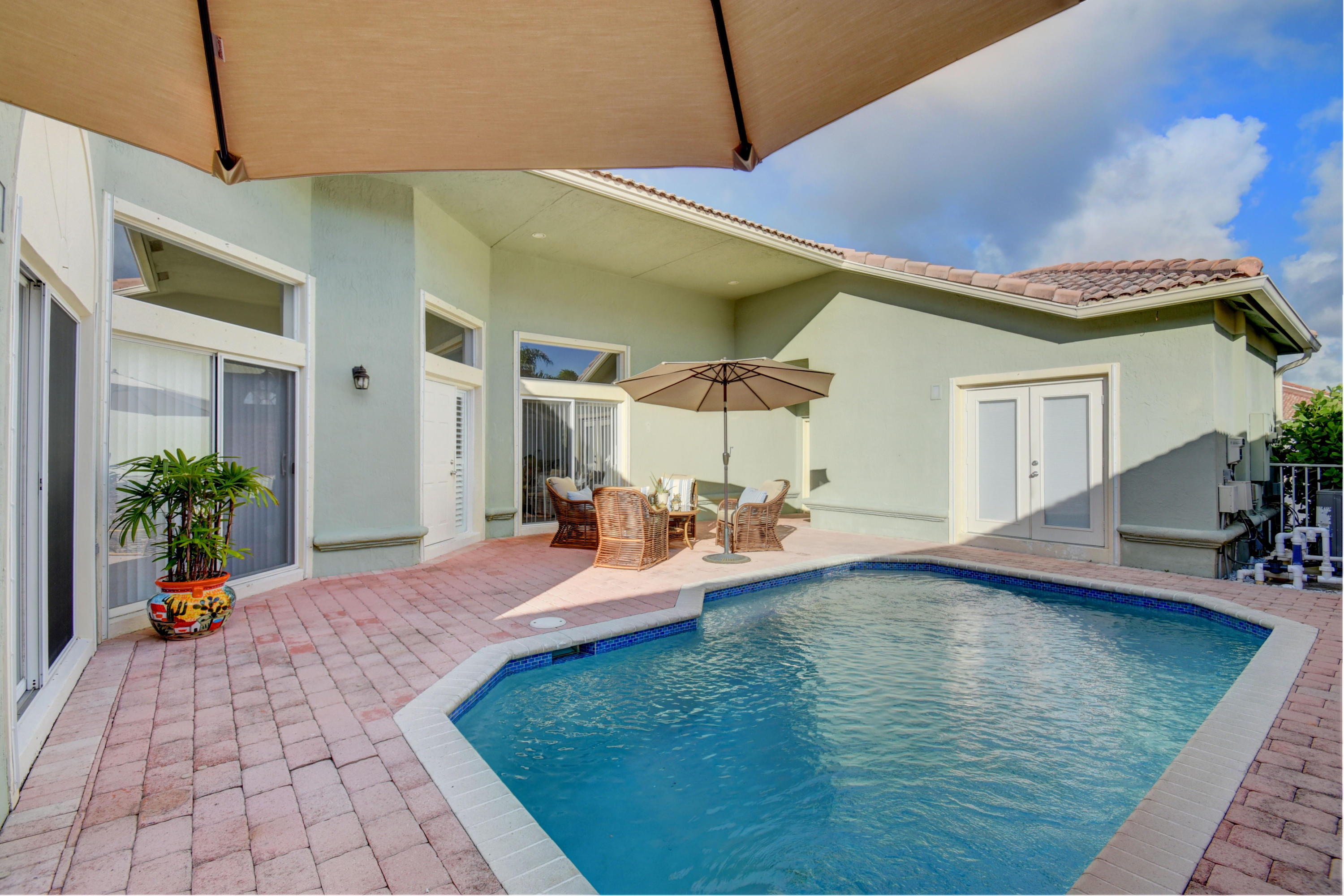 7201 Northwest Turtle Walk Boca Raton, FL 33487 - Photo 3 of 39 French Doors to Guest Room