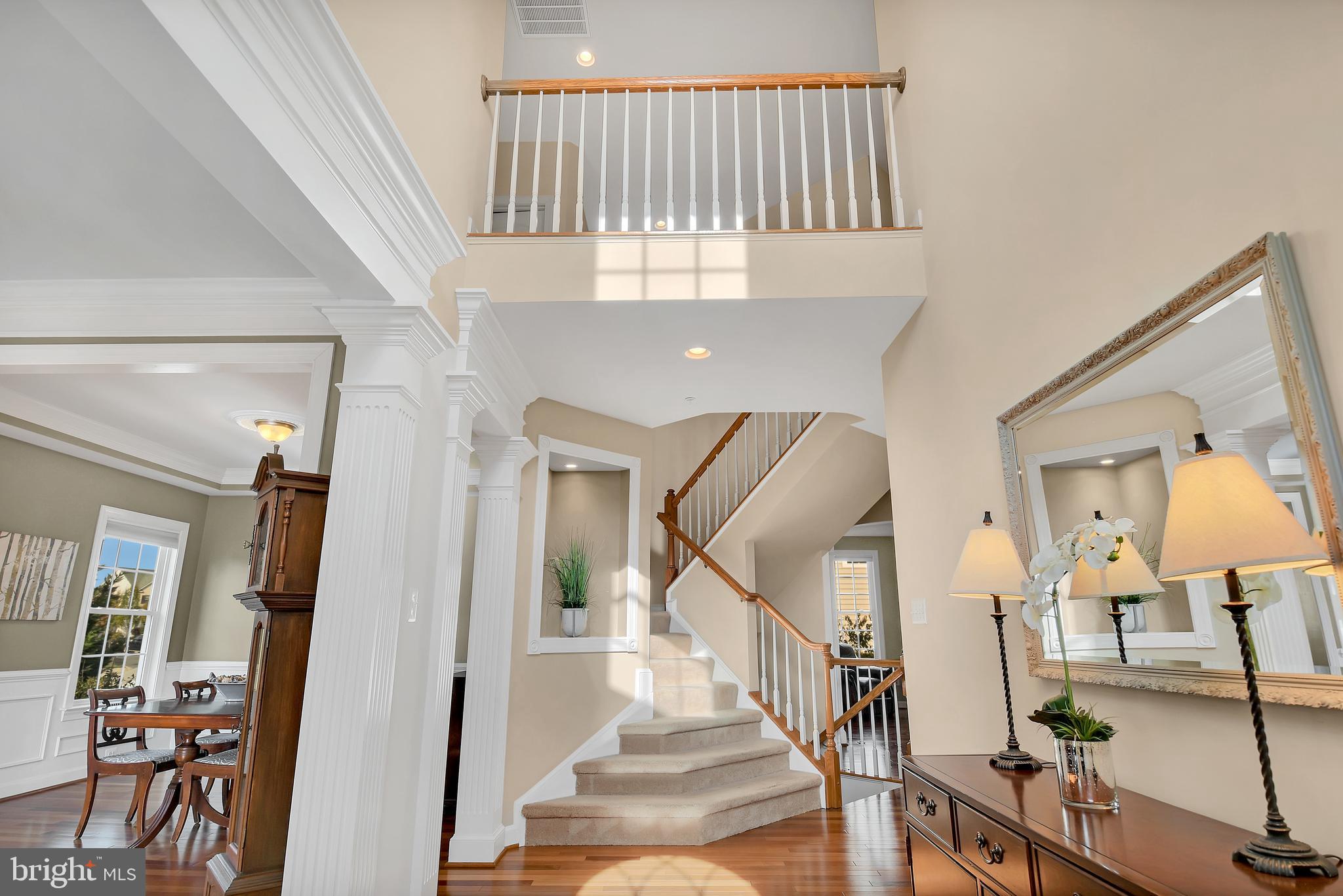 9137 Bealls Farm Road Frederick, MD 21704 - Photo 14 of 39 Breathtaking entry with waterfall staircase.