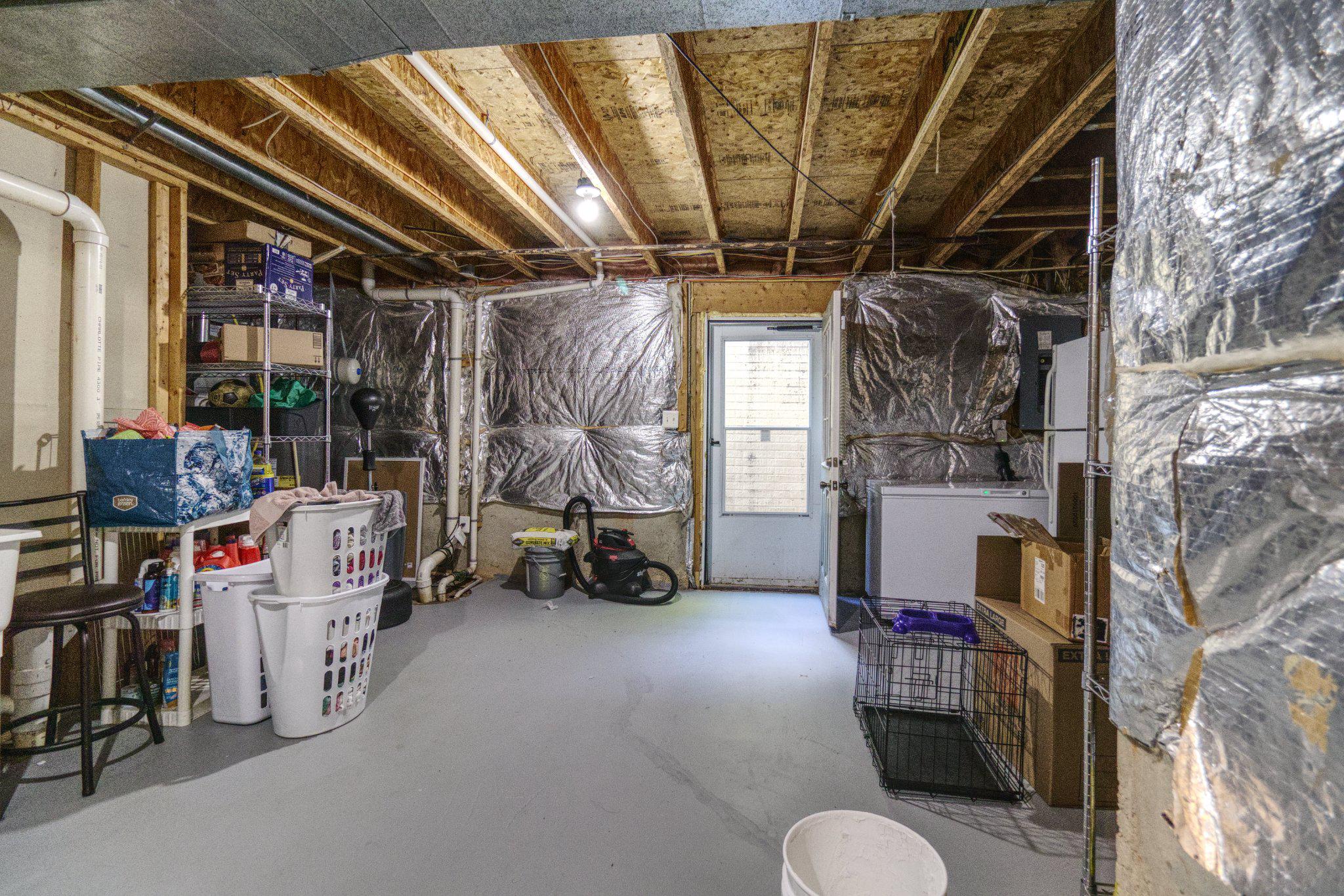 215 Seamaster Road Essex, MD 21221 - Photo 34 of 40 a view of storage and utility room