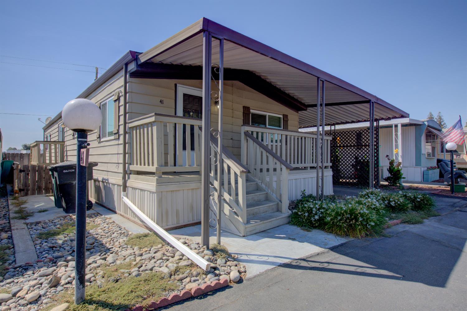 2107 Patterson Road, Unit 41 Riverbank, CA 95367 - Photo 1 of 1 a front view of a house with entryway