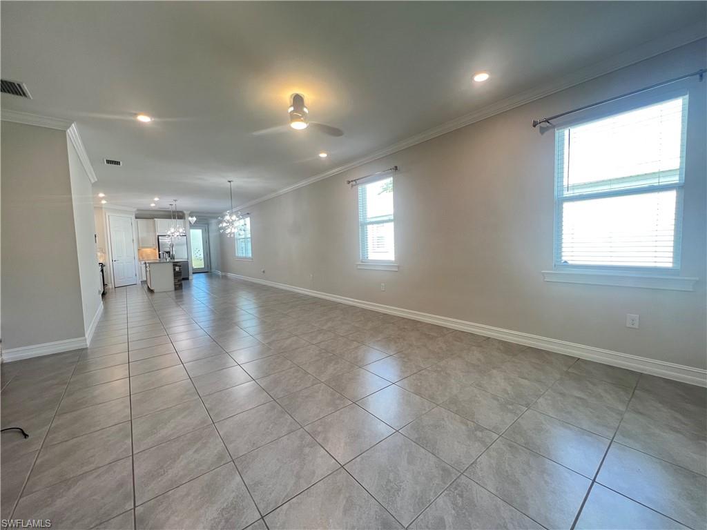 28442 Captiva Shell Loop Bonita Springs, FL 34135 - Photo 11 of 35 a view of an empty room with a window