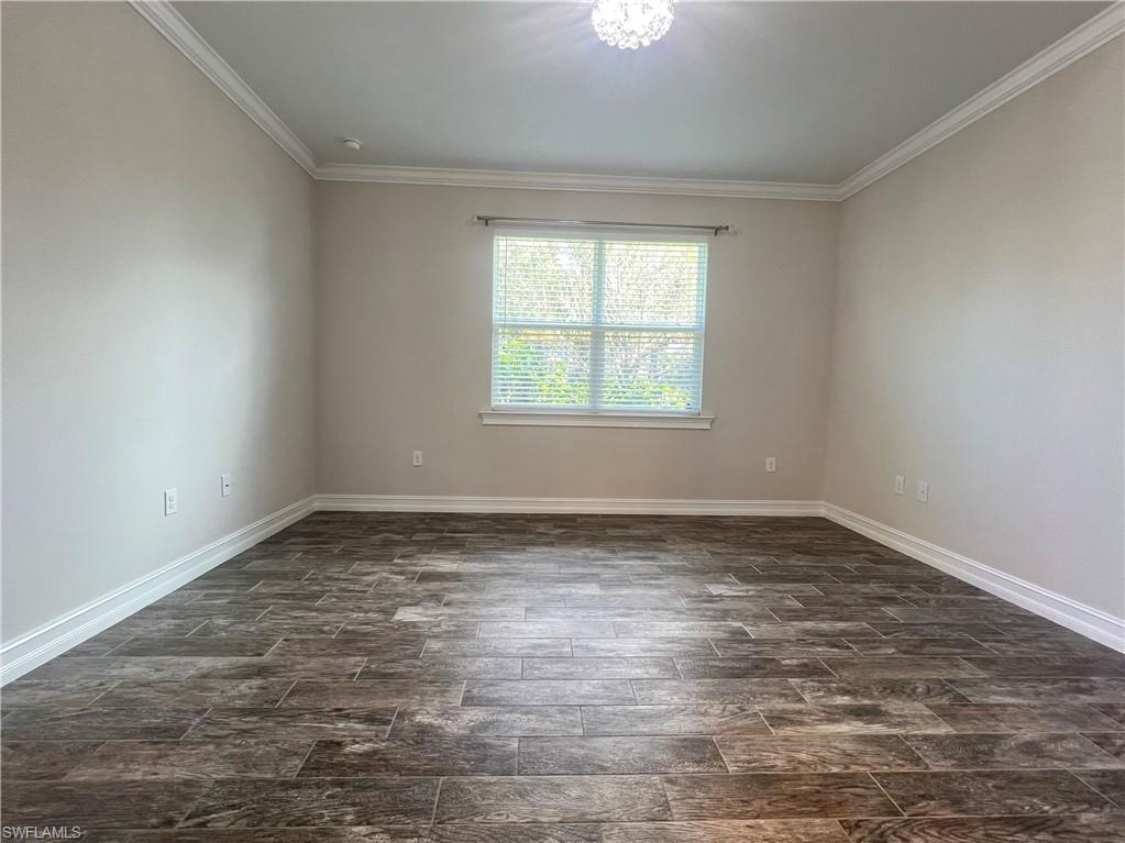 28442 Captiva Shell Loop Bonita Springs, FL 34135 - Photo 12 of 35 an empty room with a window