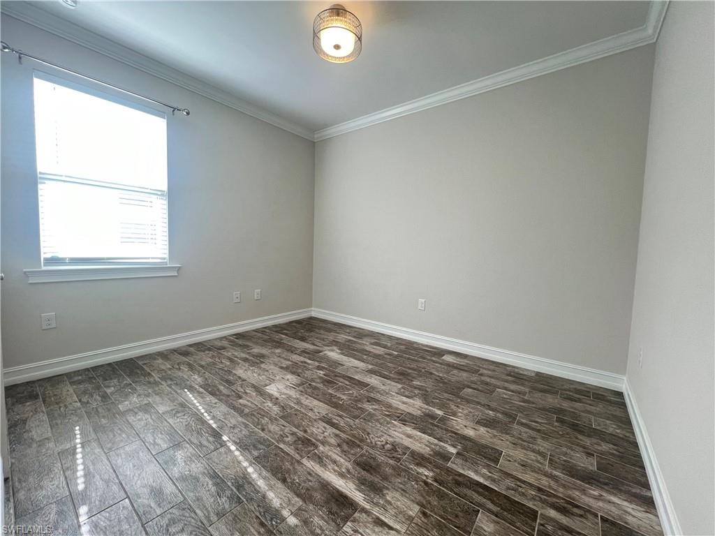 28442 Captiva Shell Loop Bonita Springs, FL 34135 - Photo 13 of 35 an empty room with a window