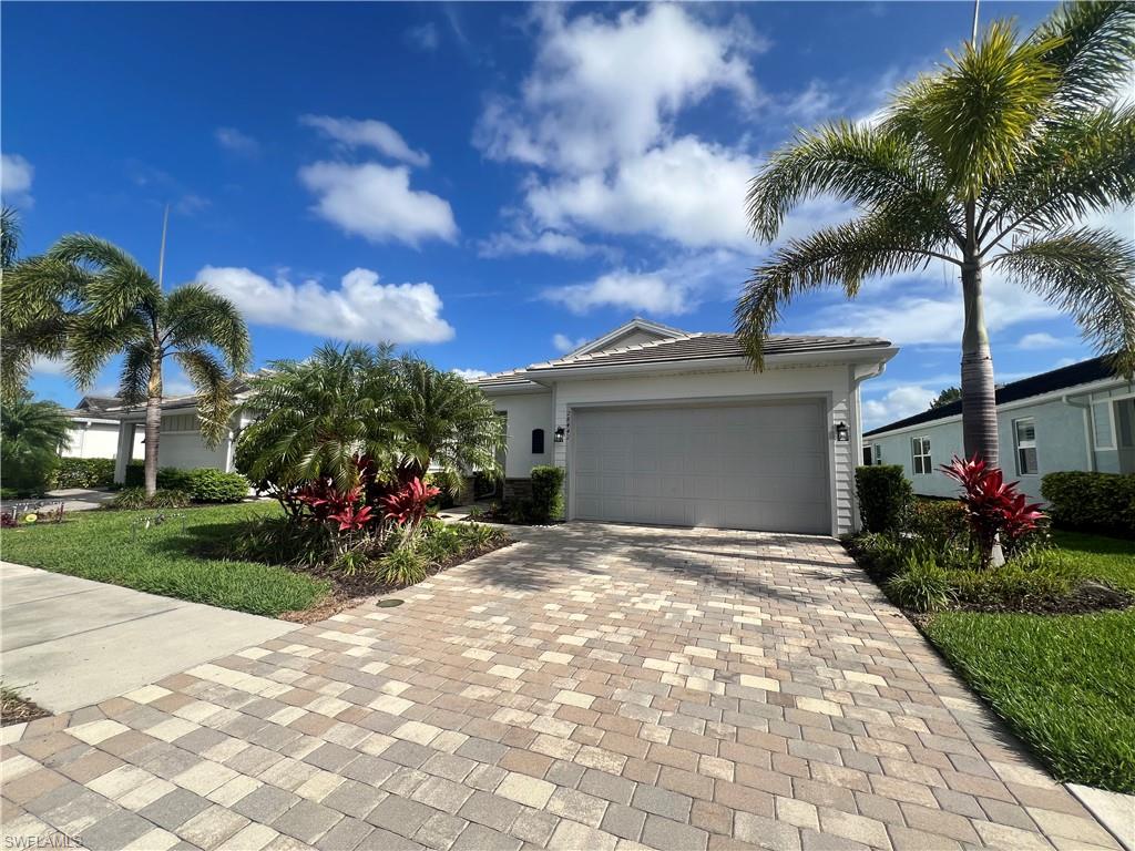 28442 Captiva Shell Loop Bonita Springs, FL 34135 - Photo 2 of 35 a view of a house with yard and tree s
