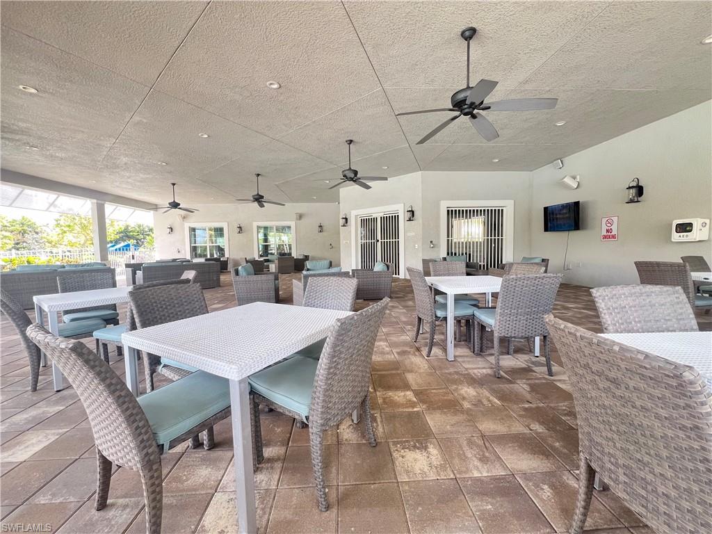 28442 Captiva Shell Loop Bonita Springs, FL 34135 - Photo 31 of 35 a view of a dining room with furniture