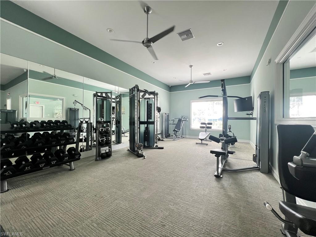 28442 Captiva Shell Loop Bonita Springs, FL 34135 - Photo 33 of 35 a view of a room with gym equipment