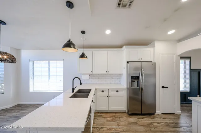 a view of empty room with windows