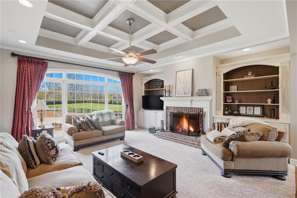 140 Red Gate Lakes Drive Canton, GA 30115 - Photo 15 of 92 a living room with furniture fireplace and flat screen tv