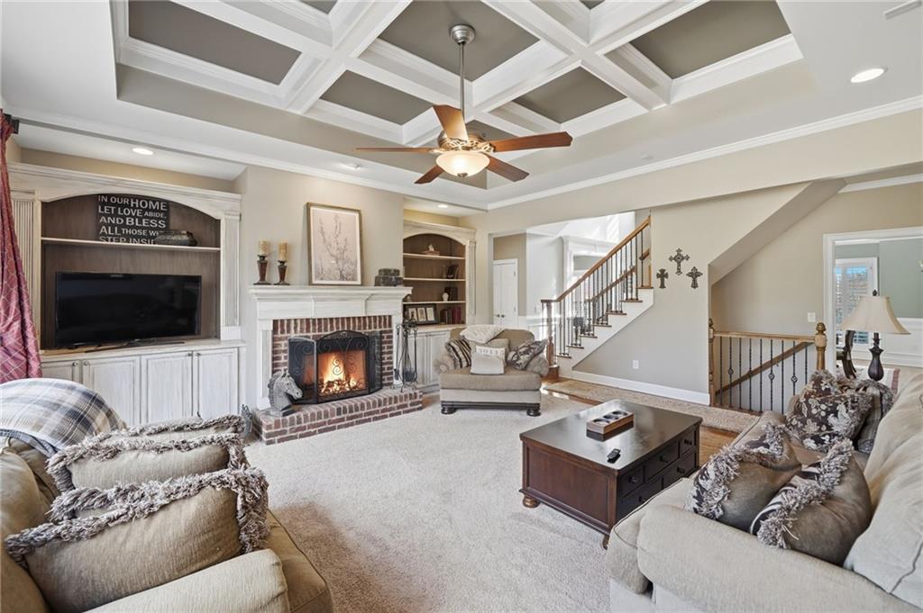 140 Red Gate Lakes Drive Canton, GA 30115 - Photo 16 of 92 a living room with furniture and a fireplace