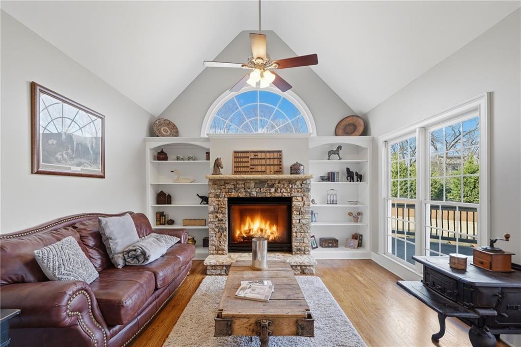 140 Red Gate Lakes Drive Canton, GA 30115 - Photo 20 of 92 a living room with furniture and a fireplace