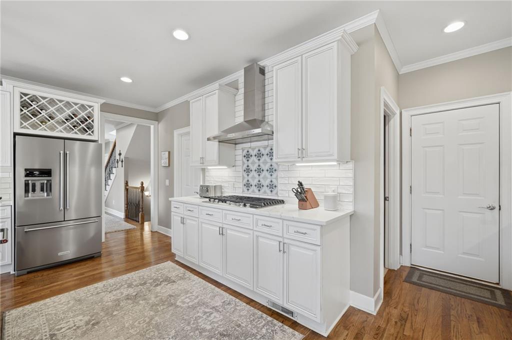 140 Red Gate Lakes Drive Canton, GA 30115 - Photo 24 of 92 a kitchen with stainless steel appliances granite countertop a refrigerator and a stove