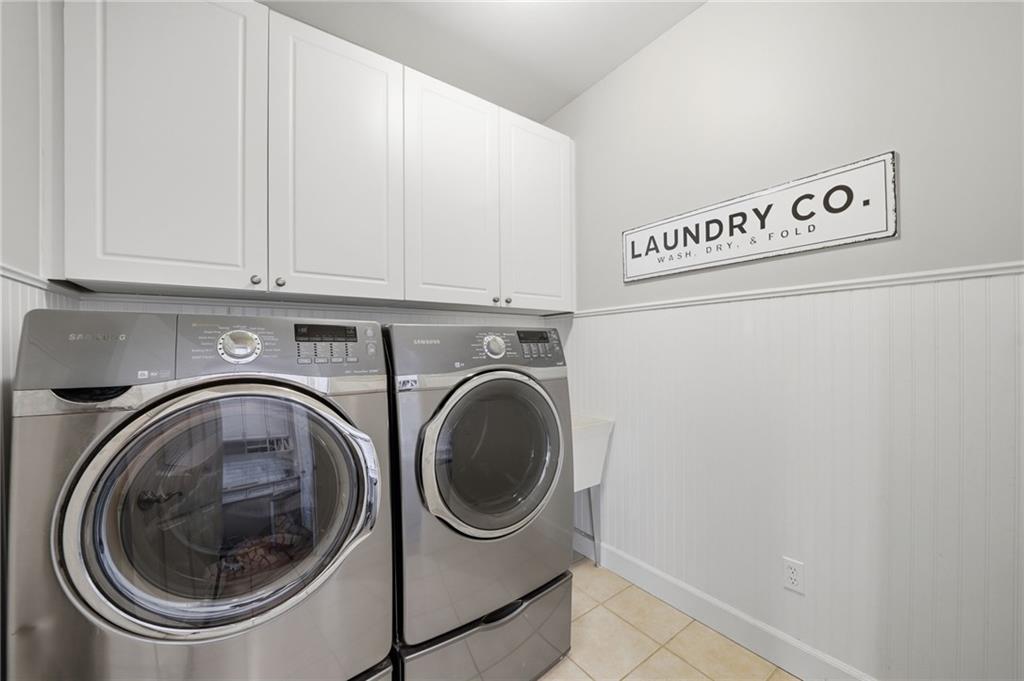 140 Red Gate Lakes Drive Canton, GA 30115 - Photo 30 of 92 a utility room with dryer and washer