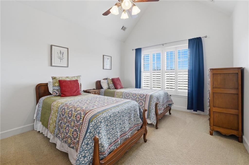 140 Red Gate Lakes Drive Canton, GA 30115 - Photo 35 of 92 a bedroom with bed and a window