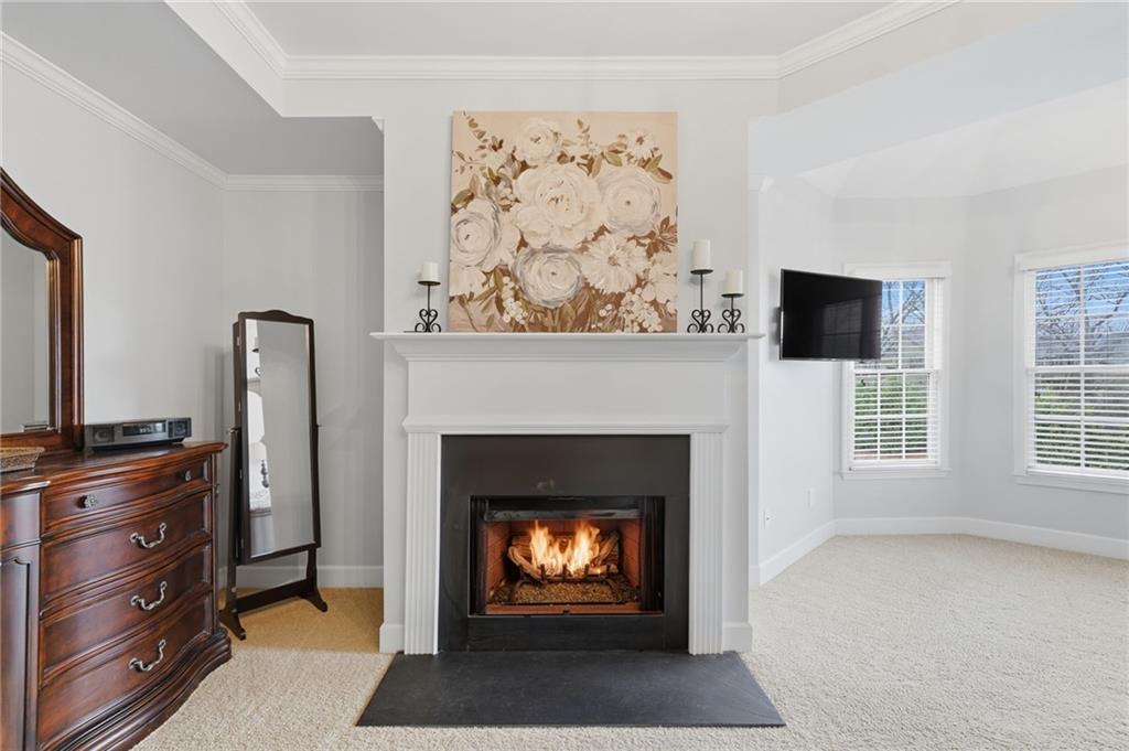 140 Red Gate Lakes Drive Canton, GA 30115 - Photo 42 of 92 a living room with furniture a fireplace and a flat screen tv