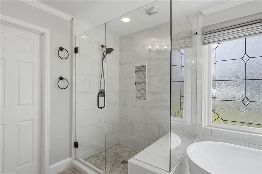 140 Red Gate Lakes Drive Canton, GA 30115 - Photo 46 of 92 a bathroom with a shower and a sink