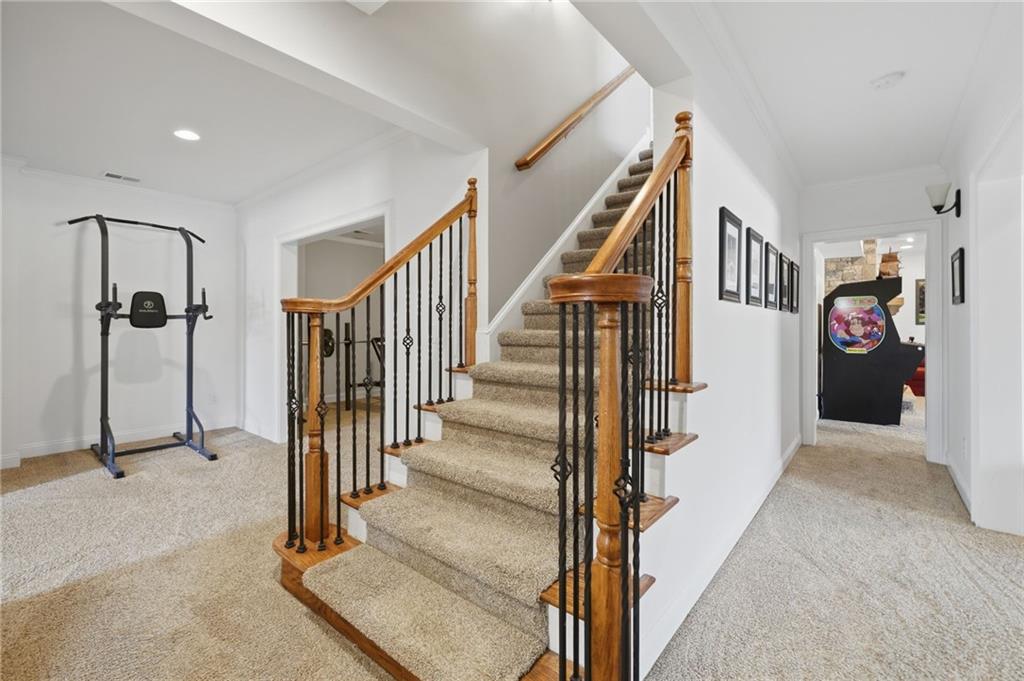 140 Red Gate Lakes Drive Canton, GA 30115 - Photo 50 of 92 a view of a hallway with staircase