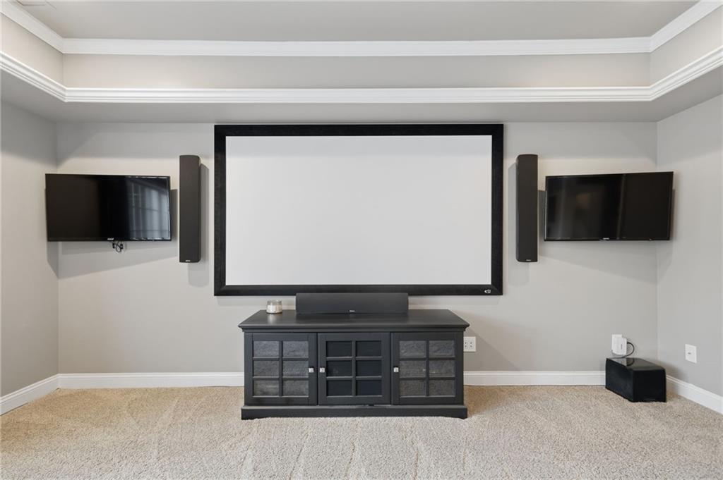 140 Red Gate Lakes Drive Canton, GA 30115 - Photo 56 of 92 a living room with flat screen tv