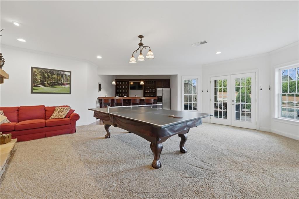 140 Red Gate Lakes Drive Canton, GA 30115 - Photo 57 of 92 a living room with furniture a table and a large window