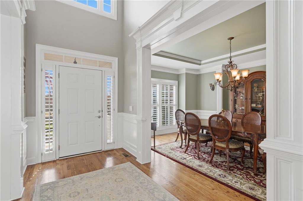 140 Red Gate Lakes Drive Canton, GA 30115 - Photo 6 of 92 a view of a livingroom with furniture and hardwood floor