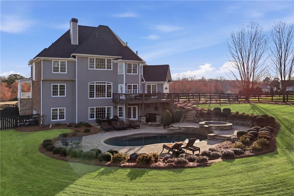 140 Red Gate Lakes Drive Canton, GA 30115 - Photo 73 of 92 a front view of a house with a yard