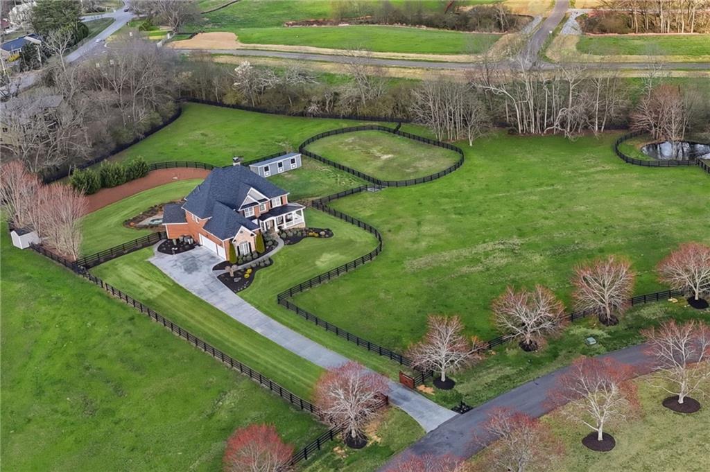 140 Red Gate Lakes Drive Canton, GA 30115 - Photo 77 of 92 an aerial view of a house with garden space and street view