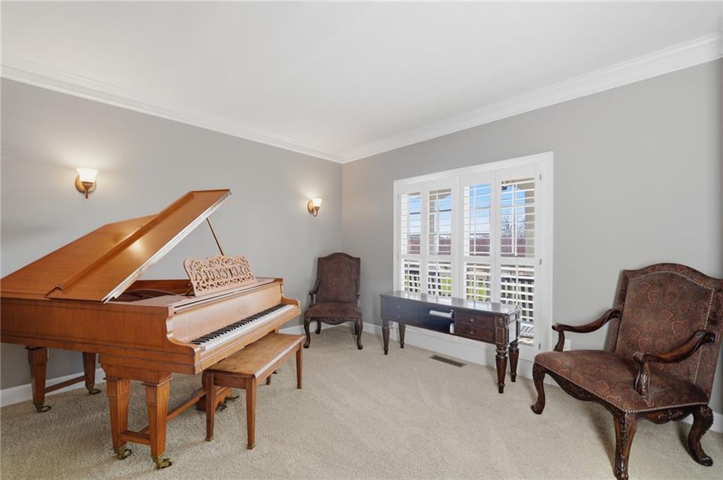 140 Red Gate Lakes Drive Canton, GA 30115 - Photo 8 of 92 a bedroom with a workspace and a window