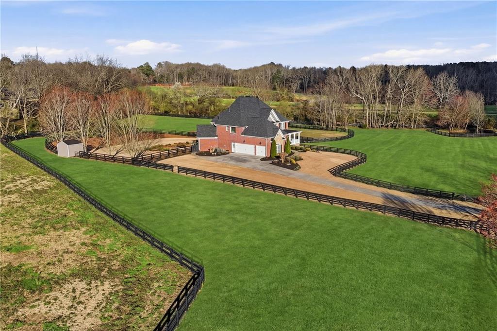 140 Red Gate Lakes Drive Canton, GA 30115 - Photo 82 of 92 a view of a garden with an outdoor space and seating area