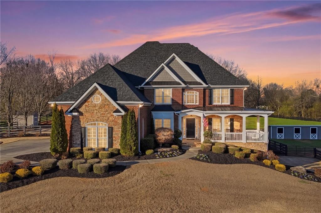 140 Red Gate Lakes Drive Canton, GA 30115 - Photo 87 of 92 a front view of a house with a yard