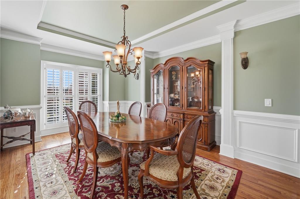 140 Red Gate Lakes Drive Canton, GA 30115 - Photo 9 of 92 a view of a dining room with furniture window and wooden floor