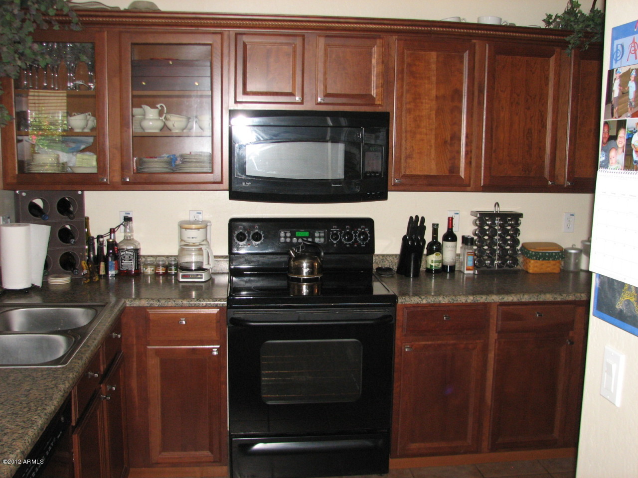 1616 East Beverly Road Phoenix, AZ 85042 - Photo 8 of 34 BEAUTIFUL KITCHEN CABINETS WITH GLASS
