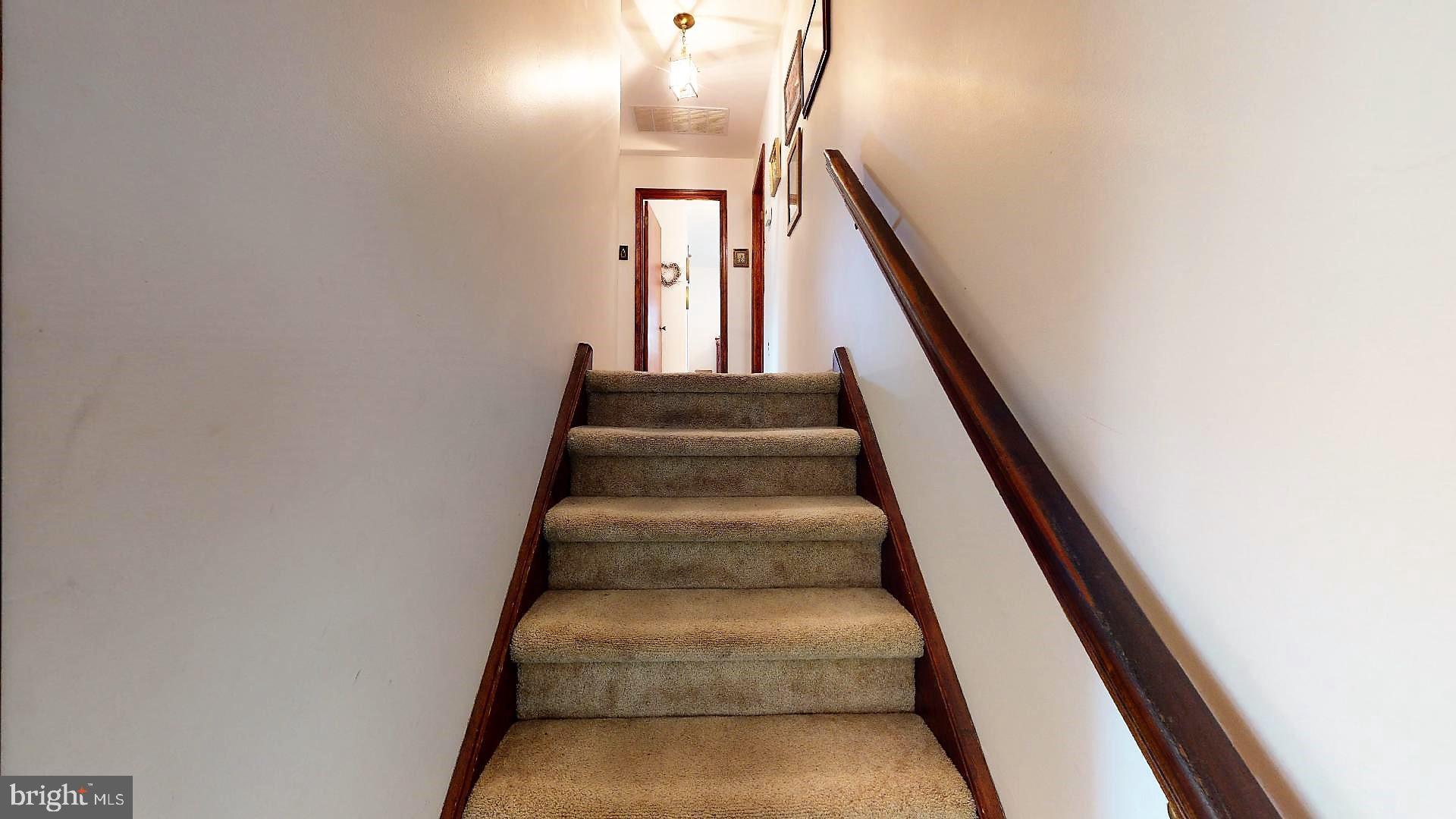 5741 Stump Road Pipersville, PA 18947 - Photo 19 of 50 Staircase to Upper Level