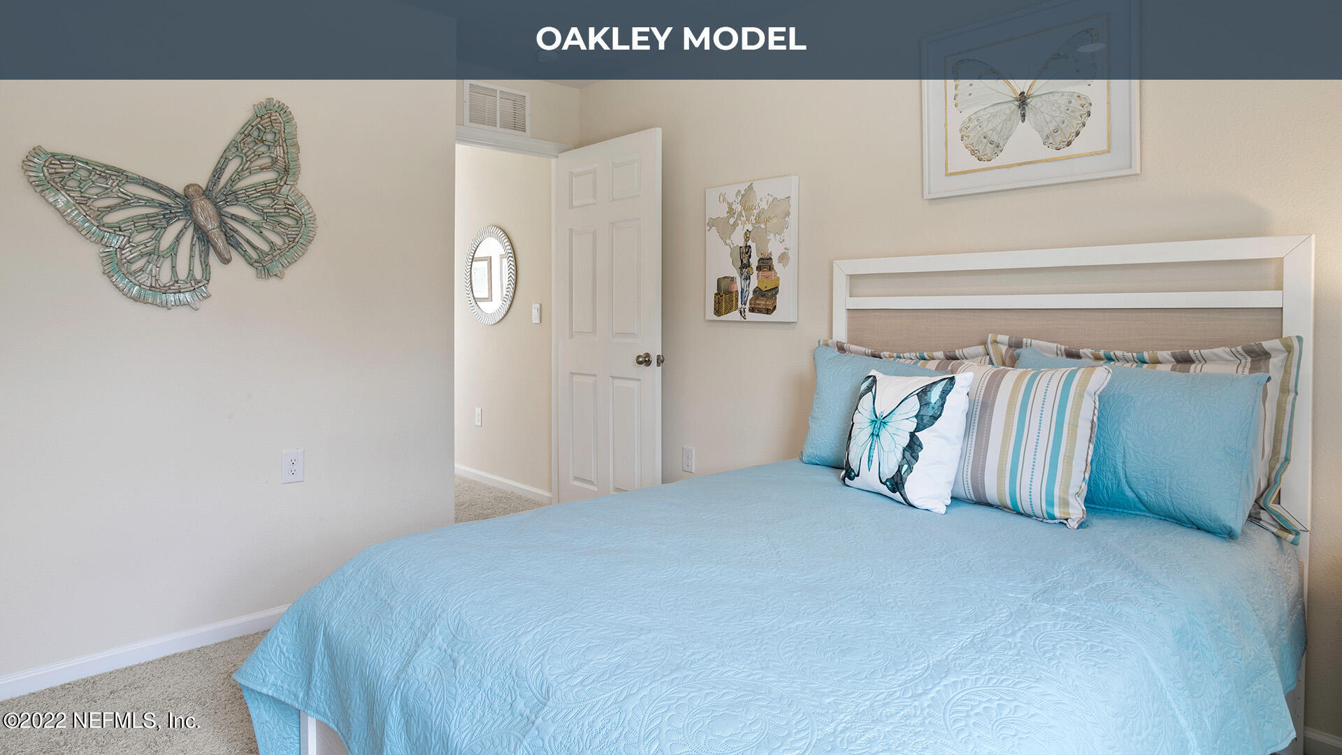 102 Java Lane St. Augustine, FL 32092 - Photo 14 of 31 a bedroom with a bed and painting on the wall