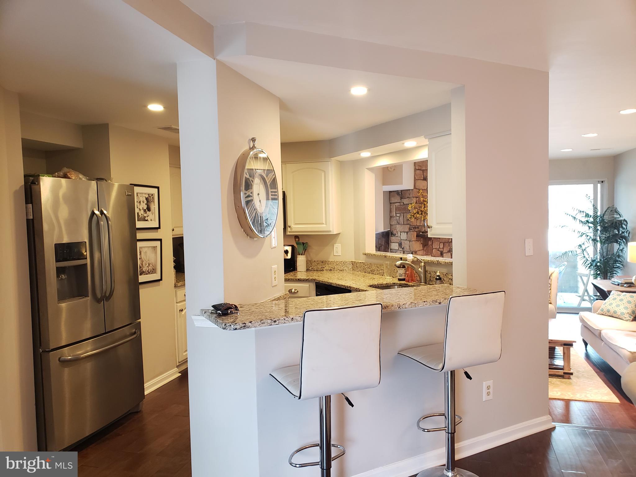 11150 Harbor Court Reston, VA 20191 - Photo 5 of 16 Fully renovated kitchen w/ S/S appl's white kitchn