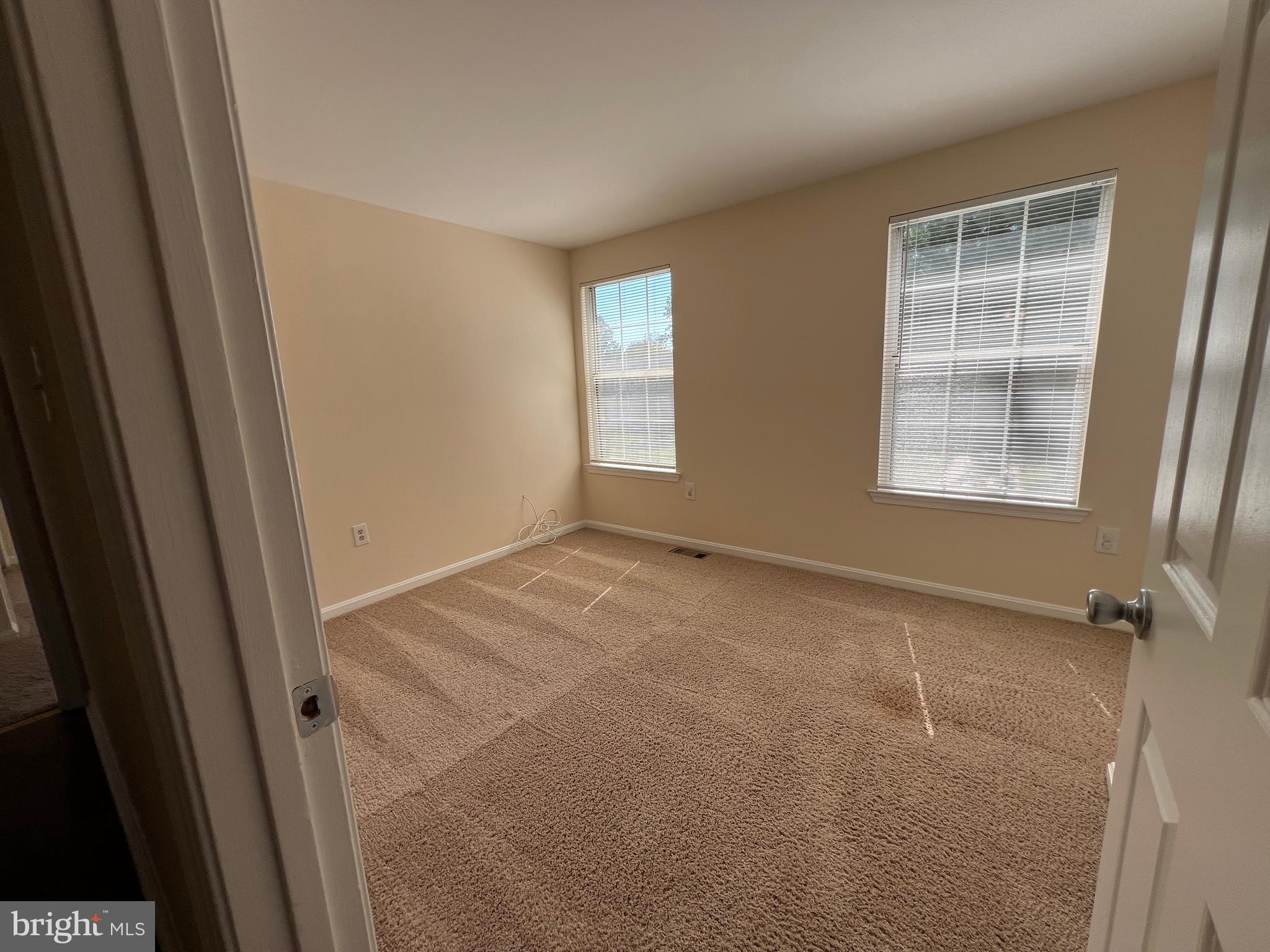 6304 Cheetah Court Waldorf, MD 20603 - Photo 20 of 30 a view of an empty room with a window