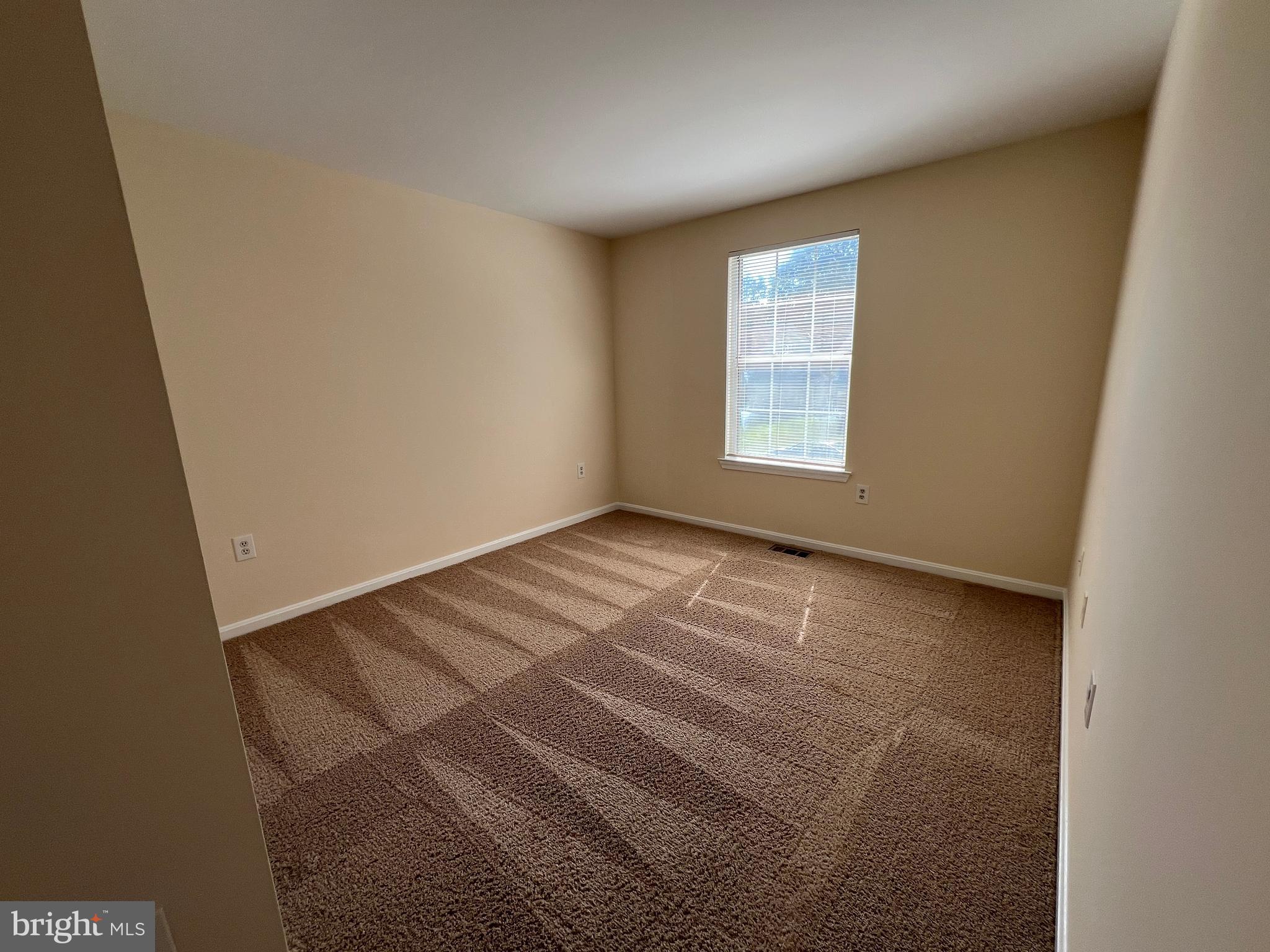 6304 Cheetah Court Waldorf, MD 20603 - Photo 21 of 30 a view of an empty room with a window