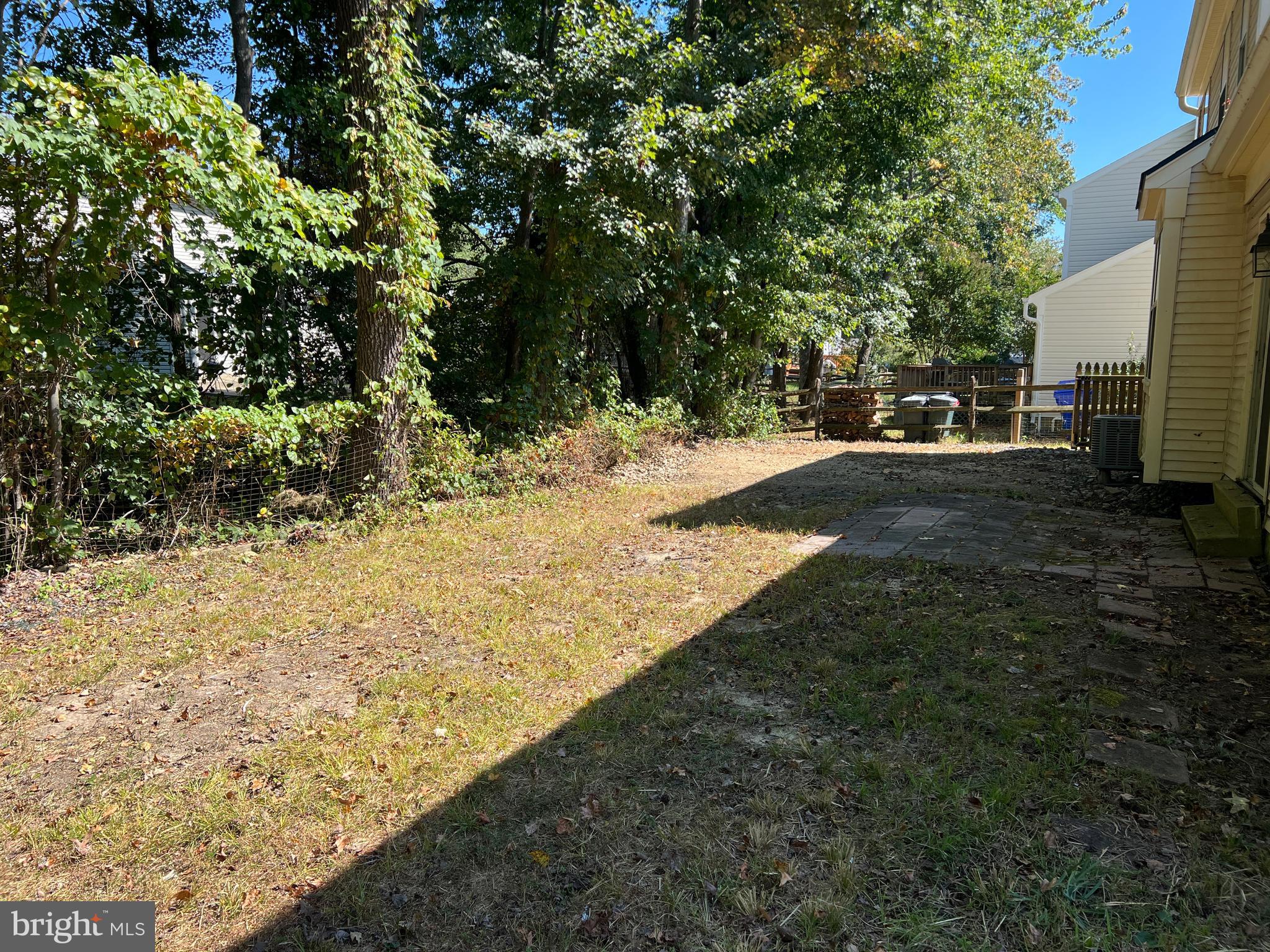 6304 Cheetah Court Waldorf, MD 20603 - Photo 27 of 30 a view of a yard with an trees