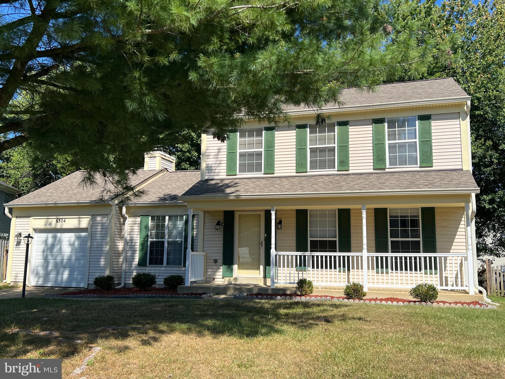 6304 Cheetah Court Waldorf, MD 20603 - Photo 29 of 30 a front view of a house with a yard