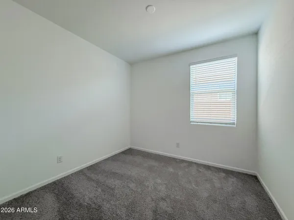 an empty room with closet