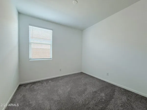 an empty room with closet