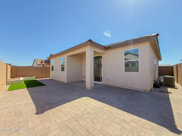 a view of a back yard of the house