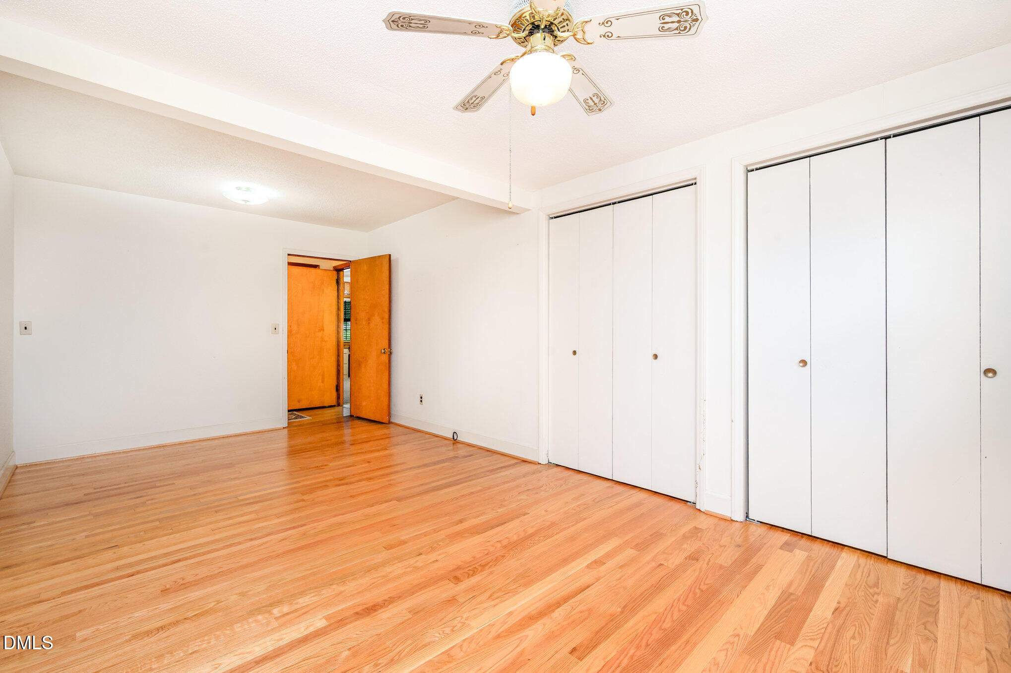 3845 Marsh Creek Road Raleigh, NC 27604 - Photo 16 of 24 a view of an empty room with wooden floor