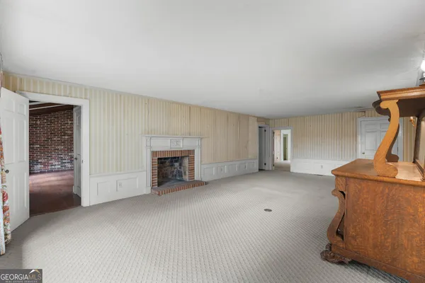 a view of a livingroom with a fireplace