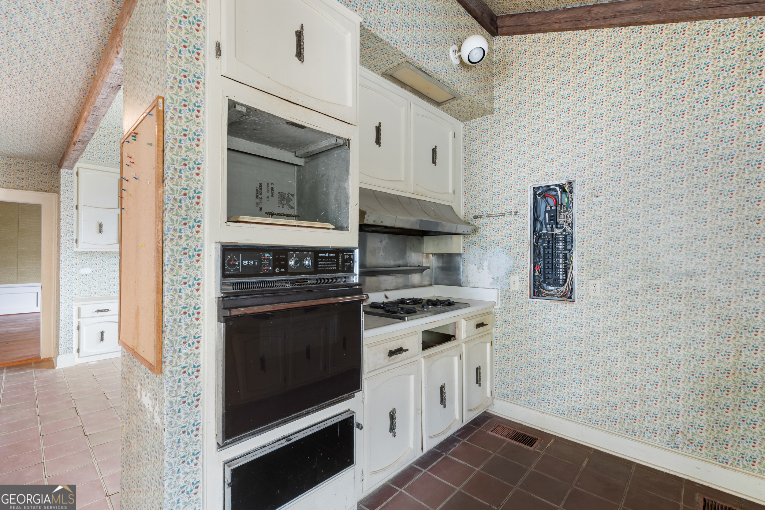 46875 Highway 46 Metter, GA 30439 - Photo 18 of 45 a kitchen with a stove and a microwave