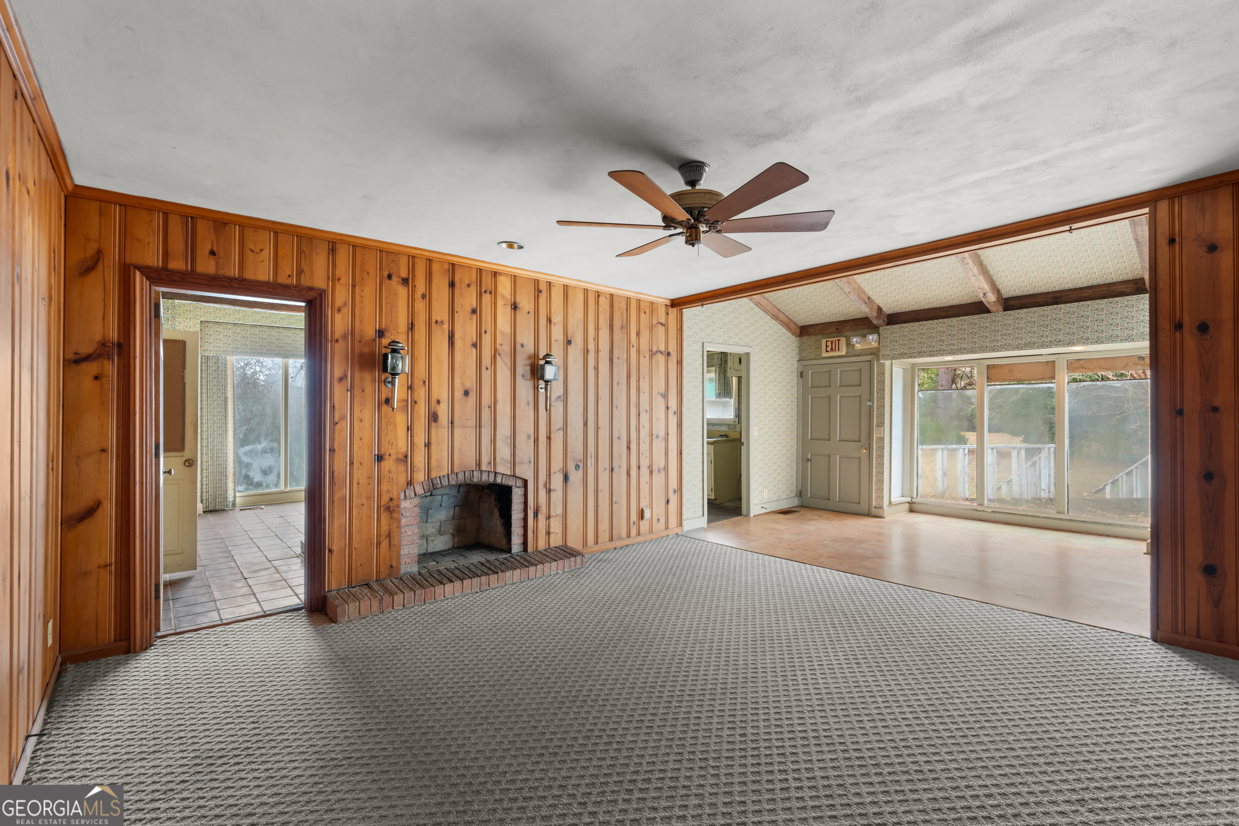 46875 Highway 46 Metter, GA 30439 - Photo 21 of 45 a view of a livingroom with an empty space and a fireplace