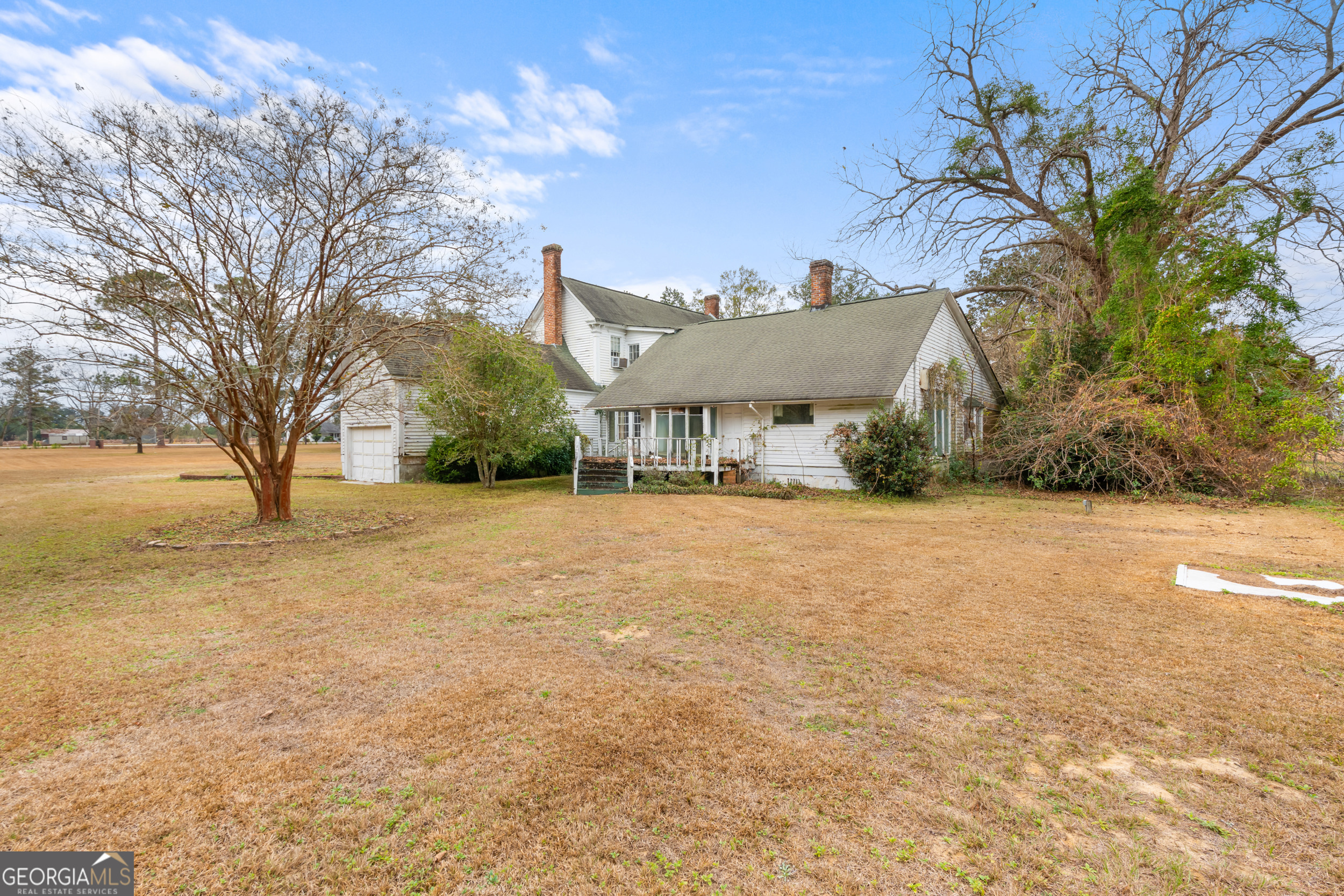 46875 Highway 46 Metter, GA 30439 - Photo 35 of 45 a view of house with yard and trees in the background