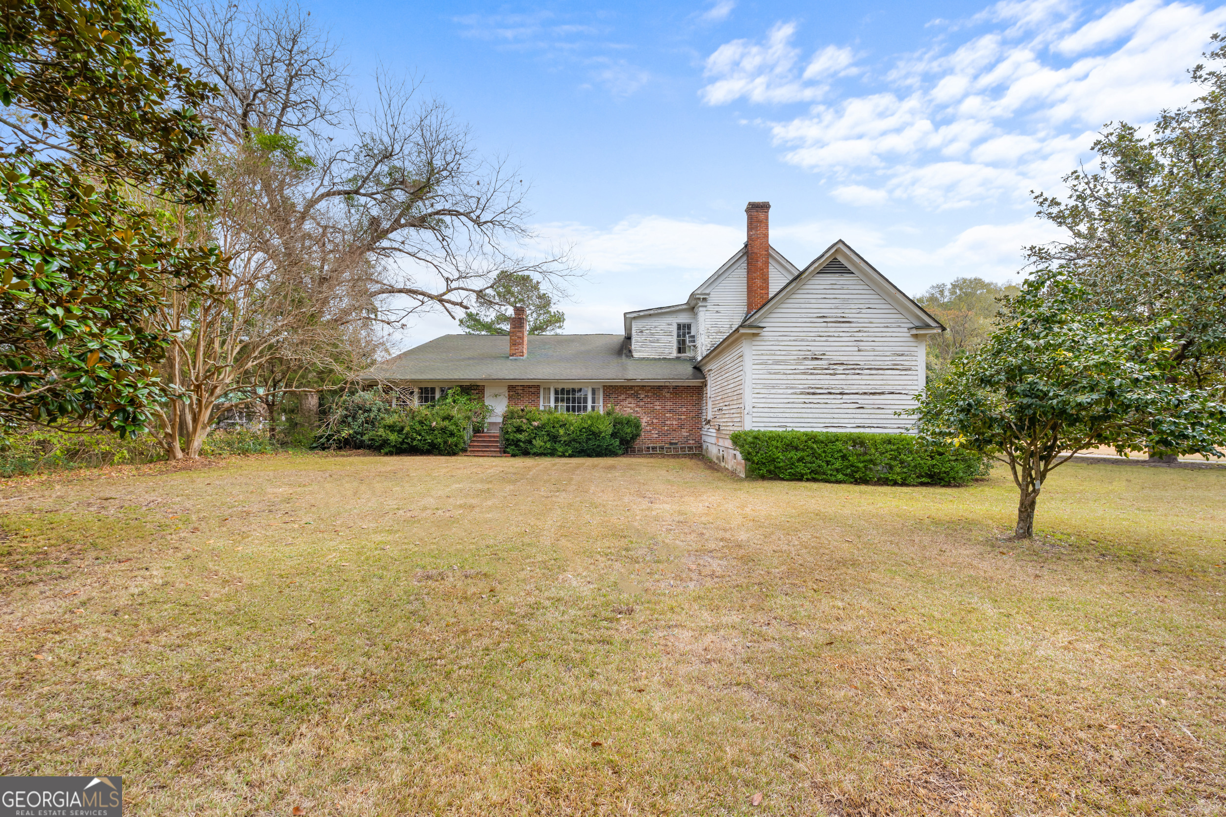 46875 Highway 46 Metter, GA 30439 - Photo 36 of 45 a view of a house with a yard and garage