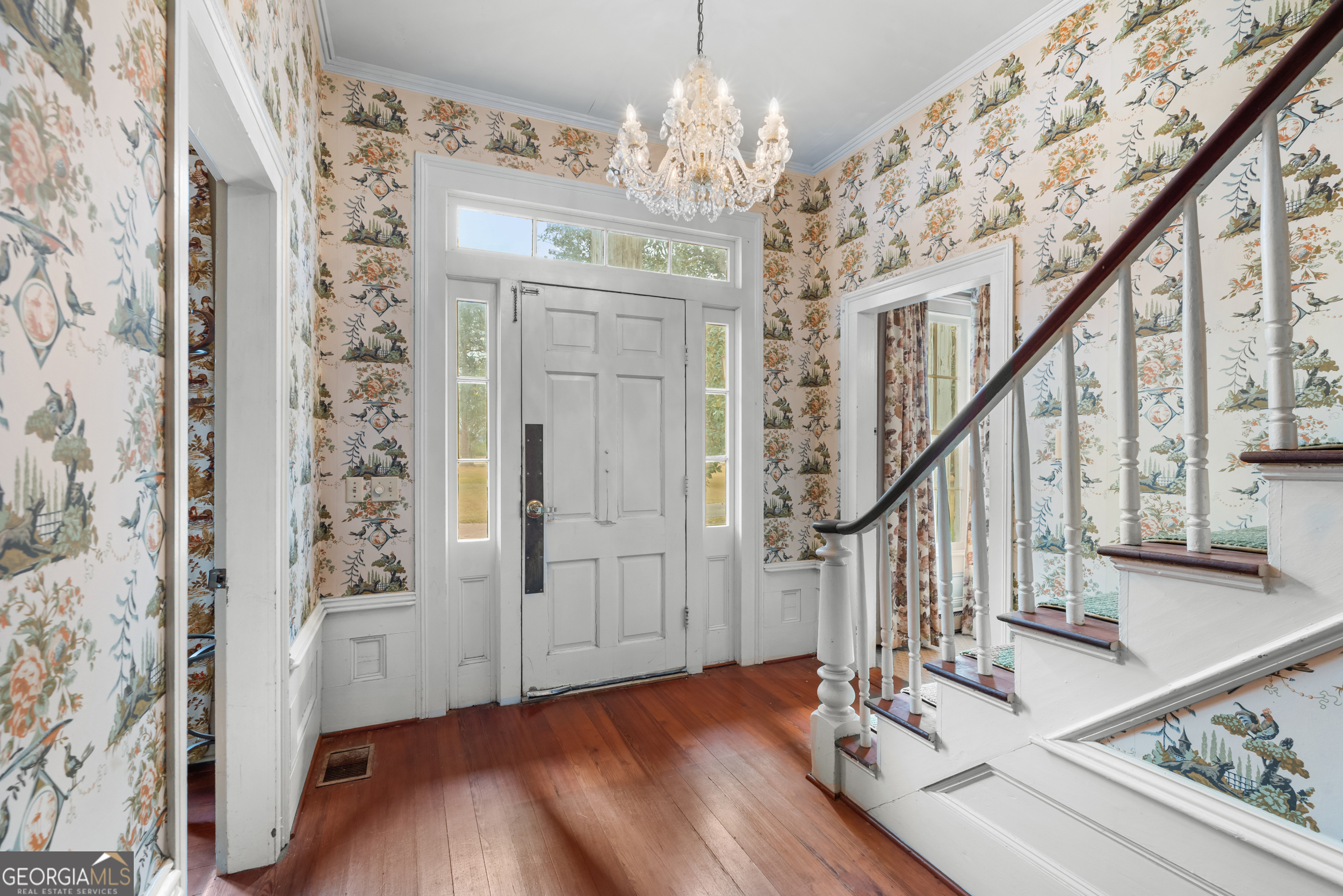 46875 Highway 46 Metter, GA 30439 - Photo 6 of 45 a view of a hallway with wooden floor and staircase
