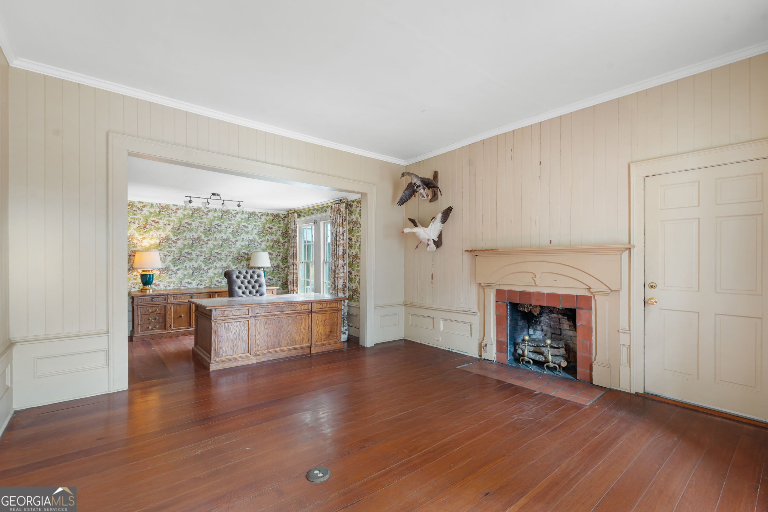 46875 Highway 46 Metter, GA 30439 - Photo 9 of 45 a living room with furniture and a fireplace